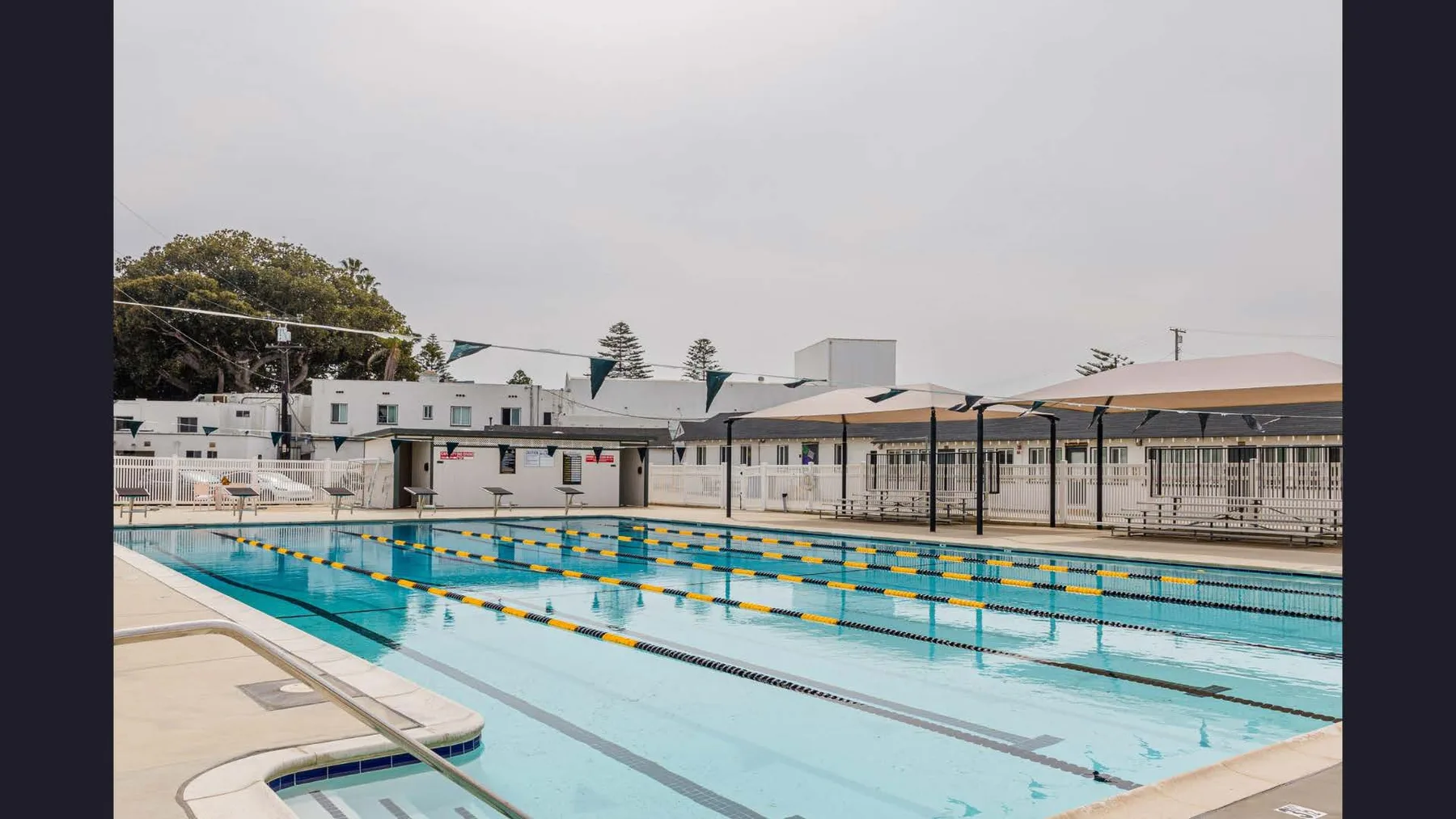 Aquatics center and swimming pool